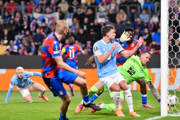 Karel Spacil (Plzen; front left) scores during the UEFA Europa League, 2nd round match: FC Viktoria Plzen vs Malmo FF, in Pilsen, Czech Republic, on October 2, 2025. On the right side is seen goalkeeper Robin Olsen (Malmo). (CTKxPhoto MiroslavxChaloupka) CTKPhotoP2025100208429  CTKPhotoP2025100208429