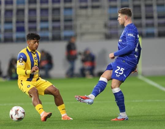 Maccabi Tel-Aviv FC and GNK Dinamo Zagreb - UEFA Europa League 2025 26 League Phase MD2 Moris Valincic of GNK Dinamo Zagreb is challeged by Kervin Andrade of Maccabi Tel-Aviv during the UEFA Europa League 2025 26 League Phase MD2 match between Maccabi Tel-Aviv FC and GNK Dinamo Zagreb at TSC Arena on October 2, 2025 in Backa Topola, Serbia.  SlobodanxSandic PIXSELL