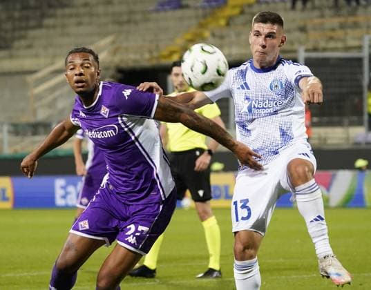 Fiorentina™s Cher Ndour fight for the ball with Sigma™s Jiri Slama during the UEFA Conference League soccer match between Fiorentina and Betis at Artemio Franchi stadium in Florence, Italy - Thursday, October 02, 2025.  Copyright: xMarcoxBucco LaxPressex