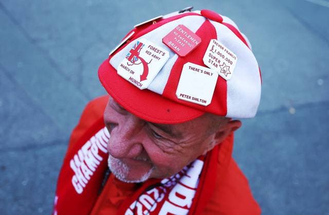A Nottingham Forest fan wearing a hat with large badges on Nottingham Forest v Midtjylland, UEFA Europa League, Group Stage, Football, City Ground, Nottingham, UK - 02 Oct 2025Nottingham City Ground United Kingdom EDITORIAL USE ONLY No use with unauthorised audio, video, data, fixture lists, club league logos or live services. Online in-match use limited to 120 images, no video emulation. No use in betting, games or single club league player publications. Copyright: xMattxWest Shutterstockx 15504058j