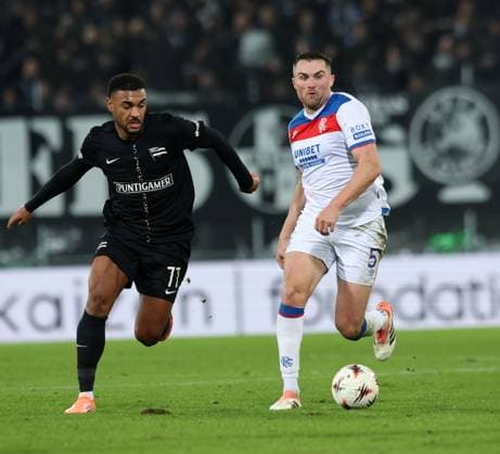 John Souttar of Rangers and Maurice Malone of SK Sturm Graz during UEFA Europa League league phase match at Merkur Arena, Graz. SK Sturm Graz v Rangers - UEFA Europa League - League Phase - Merkur Arena, Styria, Austria - 02 Oct 2025Graz Merkur Arena Styria Australia EDITORIAL USE ONLY  Copyright: xRangersxFC Shutterstockx 15514837gl