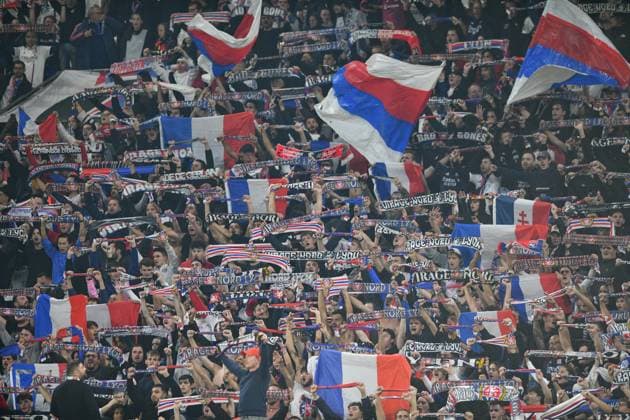 Sports : FOOTBALL - EUROPA LEAGUE - LYON v SALZBURG OL supporters with flags during the UEFA Europa League, League phase, Matchday 2 football match between Olympique Lyonnais and RB Salzburg on 2 October 2025 at Groupama Stadium in DÃ cines-Charpieu near Lyon, France - Photo Cyril Lestage DÃ cines-CharpieuFrance  Copyright: xCyrilxLestagex