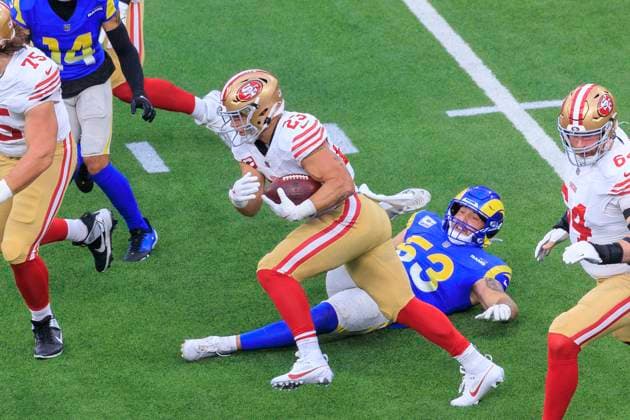 October 2, 2025, Inglewood, California, USA: 23 Christian McCaffrey, RB of the San Francisco 49ers runs past 53 Nate Landman, LB of the Los Angeles Rams during their regular NFL, American Football Herren, USA season game on Thursday October 2, 2025 at SoFi Stadium in Inglewood, California. Rams lose to 49ers, 23-26. ARIANA RUIZ PI Inglewood USA - ZUMAp124 20251002_zaa_p124_057 Copyright: xArianaxRuizx