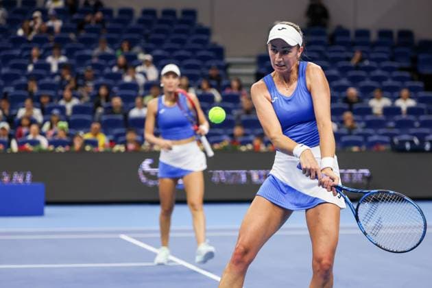 BEIJING, CHINA - OCTOBER 03: Tereza Mihalikova of Slovakia and Olivia Nicholls of Great Britain compete in the Women s Doubles Quarterfinal match against Hsieh Su-wei of Chinese Taipei and Jelena Ostapenko of Latvia on day 12 of the 2025 China Open at the National Tennis Center on October 3, 2025 in Beijing, China.  Copyright: xVCGx 111594807622