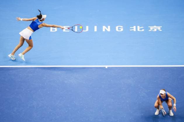BEIJING, CHINA - OCTOBER 03: Tereza Mihalikova of Slovakia and Olivia Nicholls of Great Britain compete in the Women s Doubles Quarterfinal match against Hsieh Su-wei of Chinese Taipei and Jelena Ostapenko of Latvia on day 12 of the 2025 China Open at the National Tennis Center on October 3, 2025 in Beijing, China.  Copyright: xVCGx 111594807283