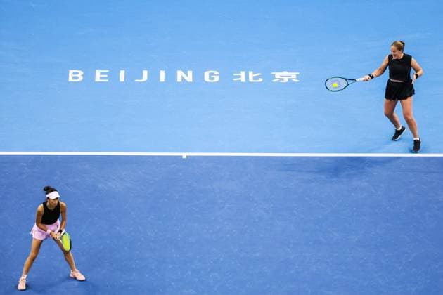 BEIJING, CHINA - OCTOBER 03: Hsieh Su-wei of Chinese Taipei and Jelena Ostapenko of Latvia compete in the Women s Doubles Quarterfinal match against Tereza Mihalikova of Slovakia and Olivia Nicholls of Great Britain on day 12 of the 2025 China Open at the National Tennis Center on October 3, 2025 in Beijing, China.  Copyright: xVCGx 111594809365