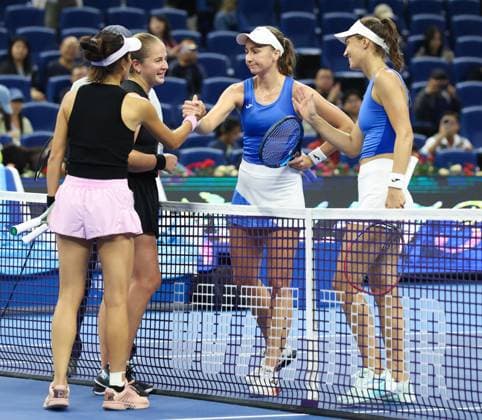 (251003) -- BEIJING, Oct. 3, 2025 -- Hsieh Su-Wei (1st L) Jelena Ostapenko (2nd L) and Tereza Mihalikova (1st R) Olivia Nicholls greet each other after the women s doubles quarterfinal match between Hsieh Su-Wei (Chinese Taipei) Jelena Ostapenko (Latvia) and Tereza Mihalikova (Slovakia) Olivia Nicholls (Britain) at 2025 China Open tennis tournament in Beijing, China, Oct. 3, 2025. (Photo by Xinhua) (SP)CHINA-BEIJING-TENNIS-CHINA OPEN-WOMEN S DOUBLES-QUARTERFINAL (CN) MaxZihan 