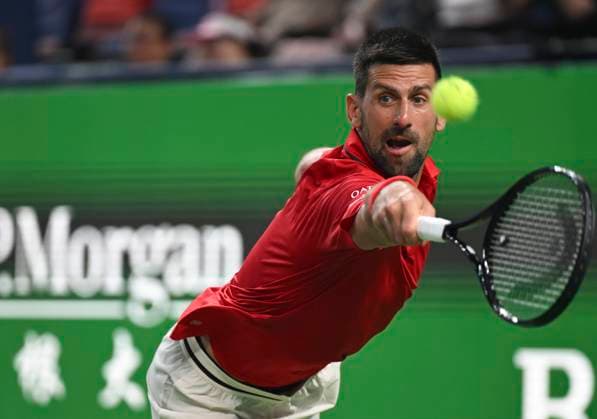 Sport Bilder des Tages (251003) -- SHANGHAI, Oct. 3, 2025 -- Novak Djokovic hits a return during the men s singles round of 64 match between Novak Djokovic of Serbia and Borna Coric of Croatia at the ATP, Tennis Herren World Tour Shanghai Masters tennis tournament in Shanghai, east China, Oct. 3, 2025. ) (SP)CHINA-SHANGHAI-TENNIS-ATP TOUR-SHANGHAI MASTERS-MEN S SINGLES (CN) ChenxHaoming 