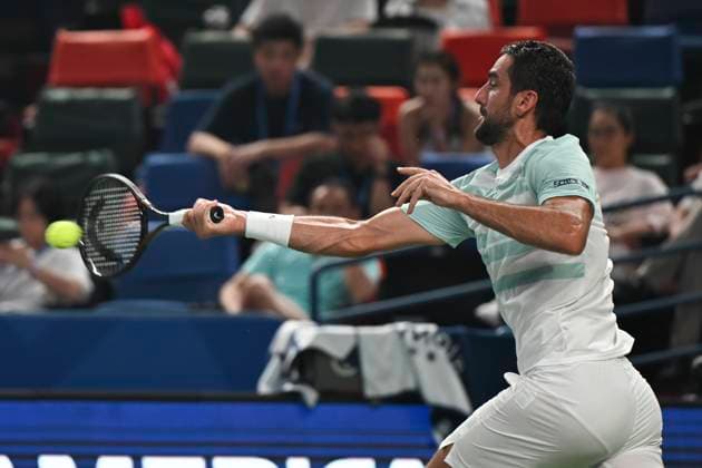 (251003) -- SHANGHAI, Oct. 3, 2025 -- Borna Coric hits a return during the men s singles round of 64 match between Novak Djokovic of Serbia and Borna Coric of Croatia at the ATP, Tennis Herren World Tour Shanghai Masters tennis tournament in Shanghai, east China, Oct. 3, 2025. ) (SP)CHINA-SHANGHAI-TENNIS-ATP TOUR-SHANGHAI MASTERS-MEN S SINGLES (CN) ChenxHaoming 
