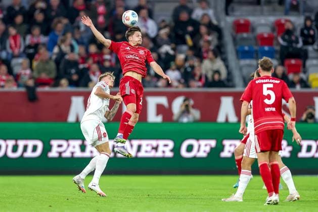 03.10.2025, Fußball, Fortuna Düsseldorf - 1.FC Nürnberg, 2. Fußball Bundesliga, Merkur Spiel-Arena, Saison 2025 2026: Tim Drexler (1FC Nuernberg 15) im Zweikampf gegen Florent Muslija (Fortuna Düsseldorf 24) DFB regulations prohibit any use of photographs as image sequences and or quasi-video. Nordrhein-Westfalen Deutschland