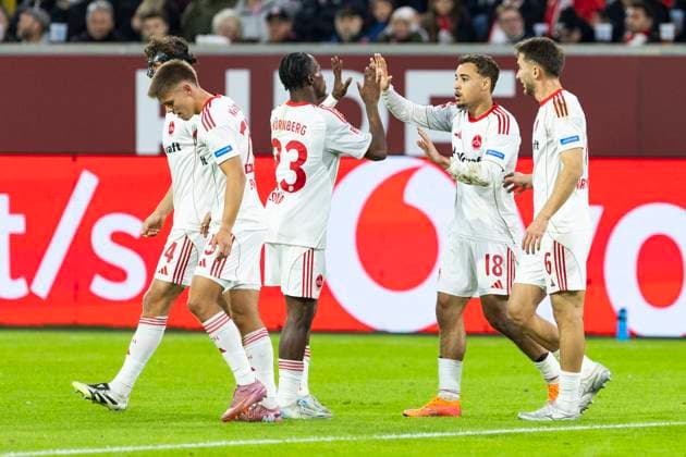 2. Fussball Bundesliga, Fortuna Düsseldorf - 1. FC Nürnberg; 03.10.2025 Rafael Lubach (1. FC Nürnberg, 18) jubelt nach seinem Tor mit Mohamed Ali Zoma (1. FC Nürnberg, 23). 2. Fußball Bundesliga, Fortuna Düsseldorf - 1. FC Nürnberg, 8. Spieltag, am 03.10.2025, Merkur Spiel-Arena, Düsseldorf. DFL regulations prohibit any use of photographs as image sequences and or quasi-video
