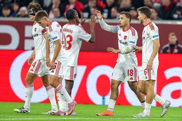 03.10.2025, Fußball, Fortuna Düsseldorf - 1.FC Nürnberg, 2. Fußball Bundesliga, Merkur Spiel-Arena, Saison 2025 2026: Torjubel nach dem Tor zum 1:0 durch Torschütze Rafael Lubach (1FC Nuernberg 18) zusammen mit Mohamed AlÃ¬ Zoma (1FC Nuernberg 23) DFB regulations prohibit any use of photographs as image sequences and or quasi-video. Nordrhein-Westfalen Deutschland
