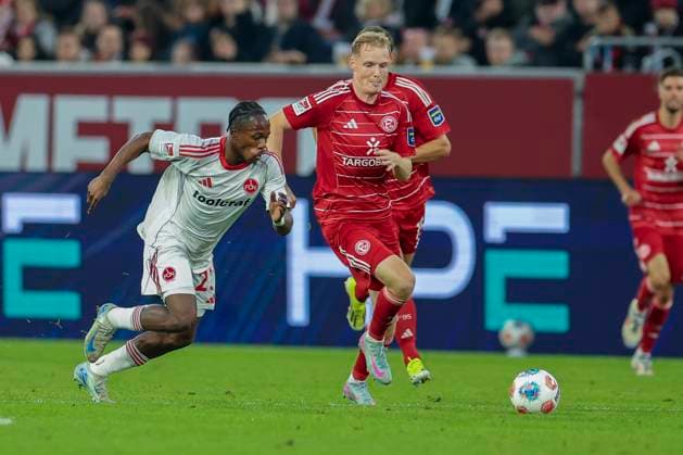 GER, 2. FBL. Fortuna Duesseldorf vs. 1. FC Nuernberg 03.10.2025, Merkur Spiel-Arena, Duesseldorf, GER, 2. FBL. Fortuna Duesseldorf vs. 1. FC Nuernberg, im Bild: Mohamed AlÃ¬ Zoma (1. FC Nuernberg 23), Tim Breithaupt (Fortuna Duesseldorf 6),