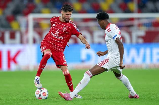 03.10.2025, Fußball, Fortuna Düsseldorf - 1.FC Nürnberg, 2. Fußball Bundesliga, Merkur Spiel-Arena, Saison 2025 2026: Anouar El Azzouzi (Fortuna Düsseldorf 08) im Zweikampf gegen Pape Demba Diop (1FC Nuernberg 20) DFB regulations prohibit any use of photographs as image sequences and or quasi-video. Nordrhein-Westfalen Deutschland