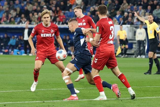 03.10.2025, xrekx, Fussball 1.Bundesliga, TSG 1899 Hoffenheim - 1.FC Köln v.l. Timo Hübers Huebers (1.FC Koeln) Tim Lemperle (TSG 1899 Hoffenheim) Dominique Heintz (1.FC Koeln) (DFL DFB REGULATIONS PROHIBIT ANY USE OF PHOTOGRAPHS as IMAGE SEQUENCES and or QUASI-VIDEO) Sinsheim
