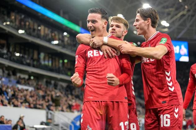 Fußball, 1. Bundesliga, 20251003, TSG 1899 Hoffenheim - 1. FC Köln. Im Bild Tor 0:1, Torjubel, v.l. Torschütze Said EL MALA (Köln, 13), Jan THIELMANN (Köln, 29), Jakub KAMINSKI (Köln, 16). Sinsheim PreZero Arena Baden Württemberg Deutschland Copyright: Passion2Press MarkusxFischerx