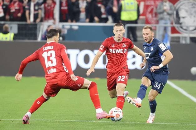 03.10.2025, xtvx, Fussball 1.Bundesliga, TSG 1899 Hoffenheim - 1.FC Köln v.l. Zweikampf, Duell, duel, tackle, compete Said El Mala (1. FC Koeln) Kristoffer Lund (1. FC Koeln) Vladimir Coufal (TSG 1899 Hoffenheim) (DFL DFB REGULATIONS PROHIBIT ANY USE OF PHOTOGRAPHS as IMAGE SEQUENCES and or QUASI-VIDEO) Sinsheim
