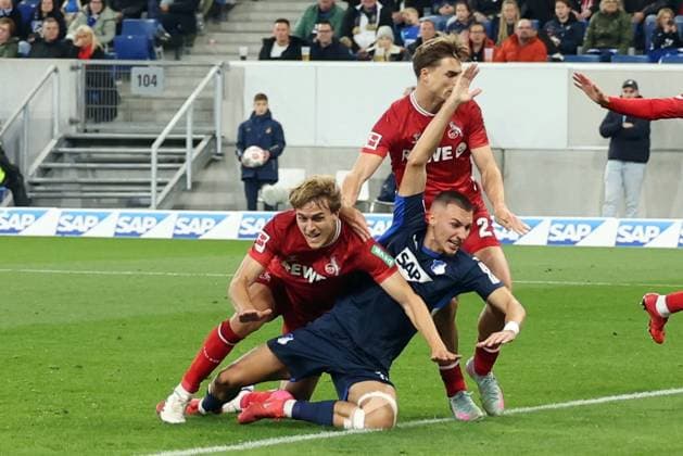 03.10.2025, xrekx, Fussball 1.Bundesliga, TSG 1899 Hoffenheim - 1.FC Köln v.l. Timo Hübers Huebers (1.FC Koeln) Tim Lemperle (TSG 1899 Hoffenheim) JoÃ«l Schmied (1.FC Koeln) (DFL DFB REGULATIONS PROHIBIT ANY USE OF PHOTOGRAPHS as IMAGE SEQUENCES and or QUASI-VIDEO) Sinsheim
