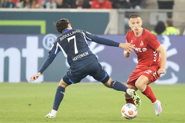 03.10.2025, xtvx, Fussball 1.Bundesliga, TSG 1899 Hoffenheim - 1.FC Köln v.l. Zweikampf, Duell, duel, tackle, compete Leon Avdullahu (TSG 1899 Hoffenheim) Kristoffer Lund (1. FC Koeln) (DFL DFB REGULATIONS PROHIBIT ANY USE OF PHOTOGRAPHS as IMAGE SEQUENCES and or QUASI-VIDEO) Sinsheim