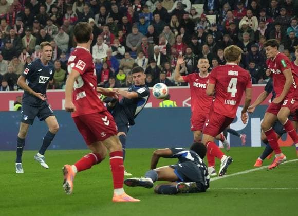 GER, 1.FBL, TSG Hoffenheim vs 1.FC Köln 03.10.2025, PreZero Arena, Sinsheim, GER, 1.FBL, TSG Hoffenheim vs 1.FC Köln , im Bild Albian Hajdari (Hoffenheim), Timo Hübers (Köln) DFL regulations prohibit any use of photographs as image sequences and or quasi-video.