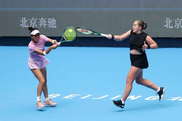 BEIJING, CHINA - OCTOBER 04: Hsieh Su-wei of Chinese Taipei and Jelena Ostapenko of Latvia compete in the Women s Doubles Semifinal match against Sara Errani of Italy and Jasmine Paolini of Italy on day 13 of the 2025 China Open at the National Tennis Center on October 4, 2025 in Beijing, China.  Copyright: xVCGx 111595005697