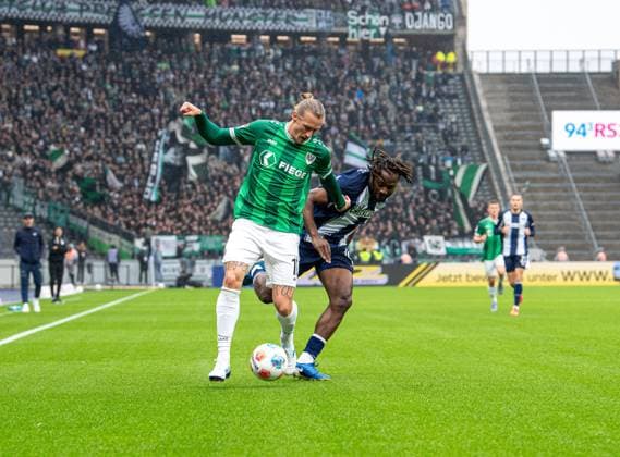 Fussball, Herren, Saison 2025 2026, 2. Bundesliga (8. Spieltag), Hertha BSC - SC Preußen Münster, v.l. Marvin Schulz (Münster), Deyovaisio Zeefuik (Hertha BSC), 04.10. 2025, Copyright: xSebastianxRäppold MatthiasxKochx