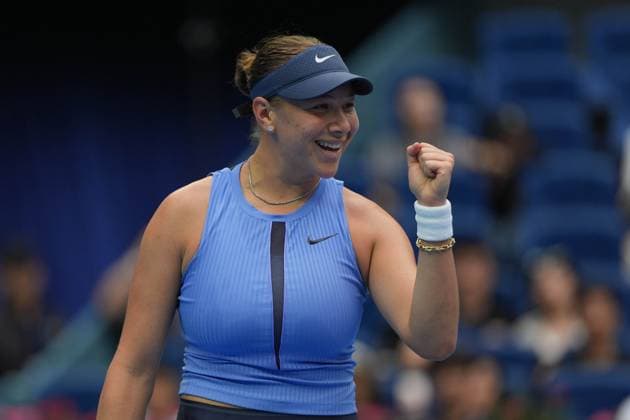 (251004) -- BEIJING, Oct. 4, 2025 -- Amanda Anisimova celebrates scoring during the women s singles semifinal match between Coco Gauff of the United States and Amanda Anisimova of the United States at 2025 China Open tennis tournament in Beijing, China, Oct. 4, 2025. ) (SP)CHINA-BEIJING-TENNIS-CHINA OPEN-WOMEN S SINGLES-SEMIFINAL (CN) XiexHan 