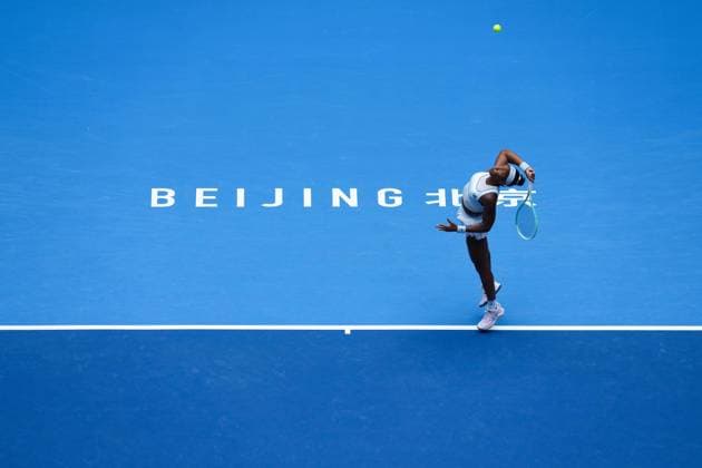 (251004) -- BEIJING, Oct. 4, 2025 -- Coco Gauff serves during the women s singles semifinal match between Coco Gauff of the United States and Amanda Anisimova of the United States at 2025 China Open tennis tournament in Beijing, China, Oct. 4, 2025. ) (SP)CHINA-BEIJING-TENNIS-CHINA OPEN-WOMEN S SINGLES-SEMIFINAL (CN) NaxYuqi 