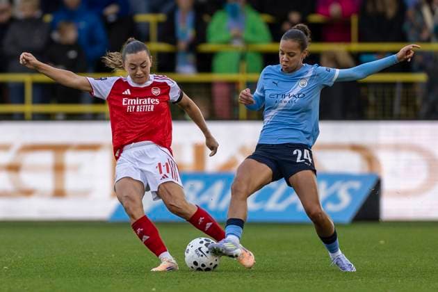 4th October 2025; Joie Stadium, Manchester, England; Womens Super League Football, Manchester City versus Arsenal; Katie McCabe of Arsenal Women is tackled by Iman Beney of Manchester City Women  TimxWilliams