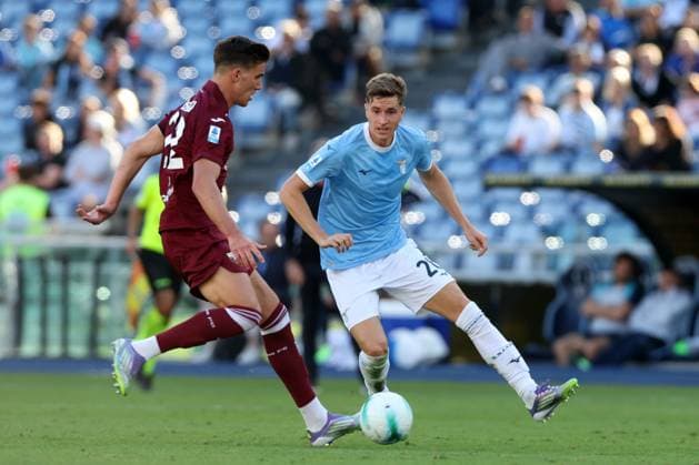 Football: Serie A Enilive 2025-2026 match SS Lazio and Torino FC Rome, Italy - October 4, 2025: Cesare Casadei of Torino, Toma Basic of Lazio seen in action during the Serie A Enilive 2025-2026 football match between SS Lazio and Torino FC at Olympic Stadium rome olympic stadium italy italy Copyright: xmarcoxiacobucci