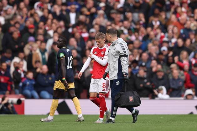 4th October 2025; Emirates Stadium, London, England; Premier League Football, Arsenal versus West Ham United; The injured Martin Odegaard of Arsenal is substituted and replaced by Martin Zubimendi  KatiexChan