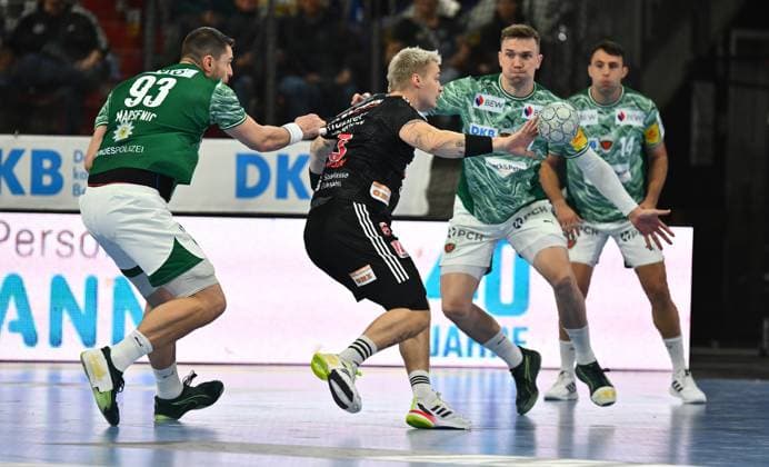 04.10.2025 - Handball - 1. Bundesliga DAIKIN HBL - Saison 2025 2026 - 07. Spieltag: HC Erlangen Metropolregion Nürnberg HCE - Füchse Berlin - - xwoxzix - Mijajlo Marsenic (93, Füchse Berlin ) Viggo Kristjansson (73, HC Erlangen HCE )