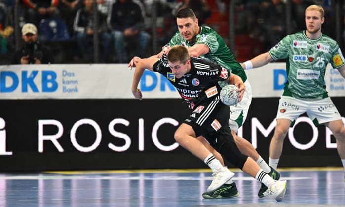 04.10.2025 - Handball - 1. Bundesliga DAIKIN HBL - Saison 2025 2026 - 07. Spieltag: HC Erlangen Metropolregion Nürnberg HCE - Füchse Berlin - - xwoxzix - Viggo Kristjansson (73, HC Erlangen HCE ) vor Mijajlo Marsenic (93, Füchse Berlin )