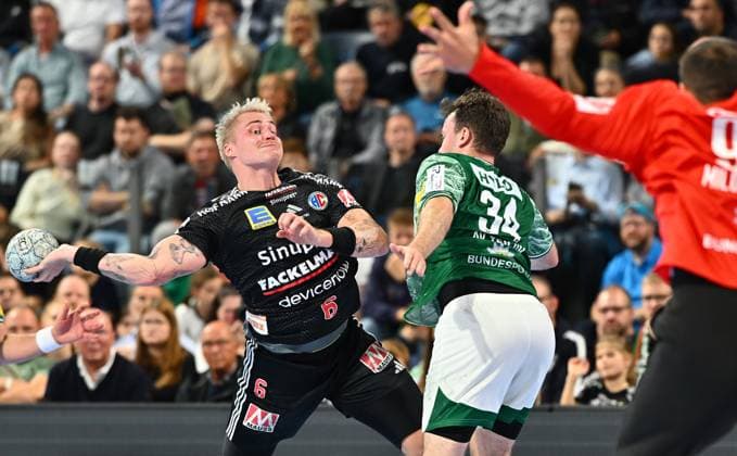 04.10.2025 - Handball - 1. Bundesliga DAIKIN HBL - Saison 2025 2026 - 07. Spieltag: HC Erlangen Metropolregion Nürnberg HCE - Füchse Berlin - - xwoxzix - ^Marek Nissen (6, HC Erlangen HCE ) Hakun West av Teigum (34, Füchse Berlin )
