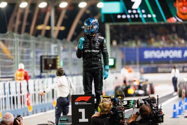 October 4, 2025, Singapore, Singapore: George Russell of Great Britain and the Mercedes-AMG PETRONAS Formula One Team celebrates after securing pole position ahead of the F1 Grand Prix of Singapore at the Marina Bay Street Circuit. Singapore Singapore - ZUMAs197 20251004_aaa_s197_344 Copyright: xGeorgexHitchensx
