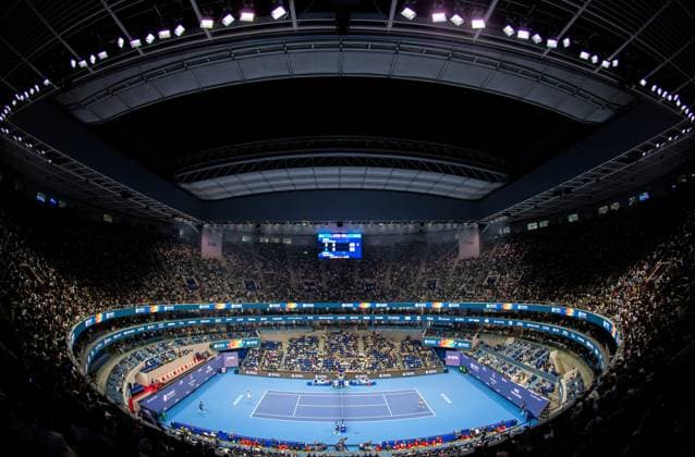 (251005) -- BEIJING, Oct. 5, 2025 -- Zheng Qinwen (L) of China and Emiliana Arango of Colombia compete during the women s singles second round match at 2025 China Open tennis tournament in Beijing, China, Sept. 27, 2025. ) Xinhua Headlines: Sports events ignite new engine for China s holiday economy HuxJingwen 