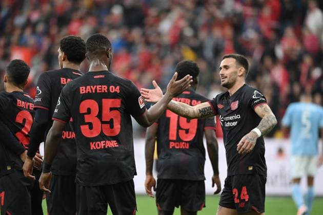 Jubel Aleix Garcia (Bayer 04 Leverkusen), Christian Kofane (Bayer 04 Leverkusen), v.re. 04.10.2025, Fussball 1. Bundesliga, Saison 2025 2026, 6. Spieltag, Bayer 04 Leverkusen - Union Berlin 2:0 DFL regulations prohibit any use of photographs as image sequences and or quasi-video Leverkusen BayArena Nordrhein Westfalen Deutschland