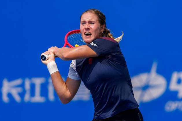 WUHAN, CHINA - OCTOBER 05: Anastasia Zakharova returns a shot in the Women s Singles Qualifying second round match against Bianca Andreescu of Canada on day 2 of 2025 Wuhan Open at Optics Valley International Tennis Center on October 5, 2025 in Wuhan, Hubei Province of China.  Copyright: xVCGx 111595178911