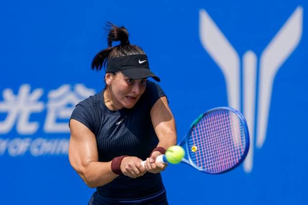 WUHAN, CHINA - OCTOBER 05: Bianca Andreescu of Canada returns a shot in the Women s Singles Qualifying second round match against Anastasia Zakharova on day 2 of 2025 Wuhan Open at Optics Valley International Tennis Center on October 5, 2025 in Wuhan, Hubei Province of China.  Copyright: xVCGx 111595178884
