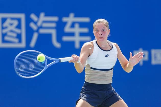 WUHAN, CHINA - OCTOBER 05: Antonia Ruzic of Croatia returns a shot in the Women s Singles Qualifying second round match against Emiliana Arango of Colombia on day 2 of 2025 Wuhan Open at Optics Valley International Tennis Center on October 5, 2025 in Wuhan, Hubei Province of China.  Copyright: xVCGx 111595182631
