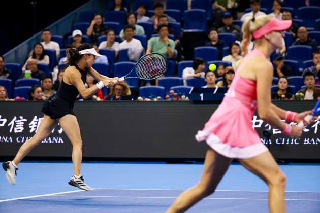 BEIJING, CHINA - OCTOBER 05: Miyu Kato of Japan and Fanny Stollar of Hungary return a shot in the Women s Doubles Final match against Sara Errani and Jasmine Paolini of Italy on day 14 of the 2025 China Open at the National Tennis Center on October 5, 2025 in Beijing, China.  Copyright: xVCGx 111595194903