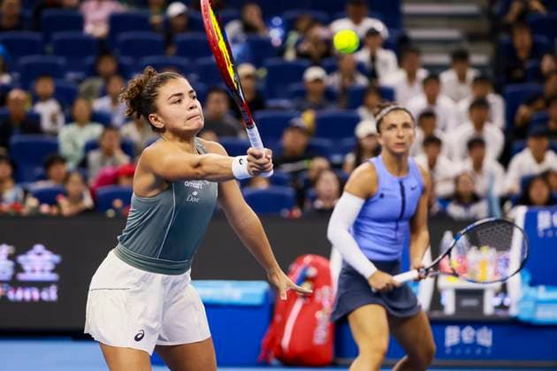 BEIJING, CHINA - OCTOBER 05: Sara Errani and Jasmine Paolini of Italy return a shot in the Women s Doubles Final match against Miyu Kato of Japan and Fanny Stollar of Hungary on day 14 of the 2025 China Open at the National Tennis Center on October 5, 2025 in Beijing, China.  Copyright: xVCGx 111595194802