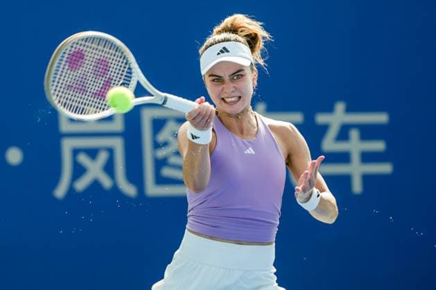 WUHAN, CHINA - OCTOBER 05: Iva Jovic of the United States returns a shot in the Women s Singles Qualifying second round match against Varvara Gracheva of France on day 2 of 2025 Wuhan Open at Optics Valley International Tennis Center on October 5, 2025 in Wuhan, Hubei Province of China.  Copyright: xVCGx 111595195393