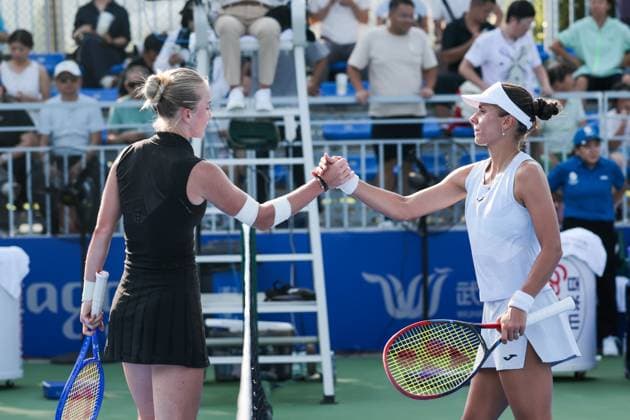 WUHAN, CHINA - OCTOBER 05: Polina Kudermetova shakes hands with Viktoriya Tomova of Bulgaria in the Women s Singles Qualifying second round match on day 2 of 2025 Wuhan Open at Optics Valley International Tennis Center on October 5, 2025 in Wuhan, Hubei Province of China.  Copyright: xVCGx 111595195976