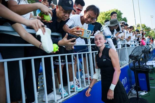 WUHAN, CHINA - OCTOBER 05: Polina Kudermetova takes a selfie with fans after the Women s Singles Qualifying second round match against Viktoriya Tomova of Bulgaria on day 2 of 2025 Wuhan Open at Optics Valley International Tennis Center on October 5, 2025 in Wuhan, Hubei Province of China.  Copyright: xVCGx 111595195942