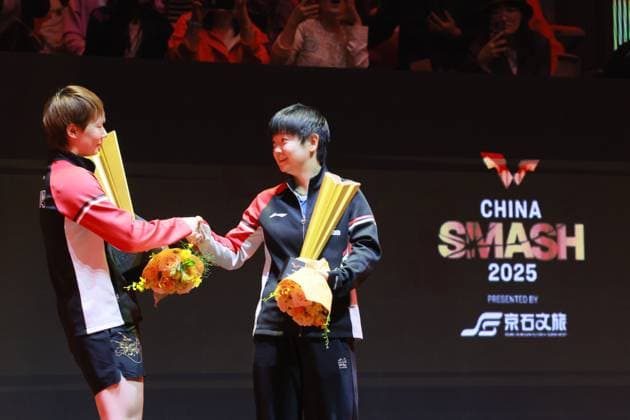BEIJING, CHINA - OCTOBER 05: Champion Wang Manyu (L) of China, runner-up Sun Yingsha of China pose during the medal ceremony following the Women s Singles Final match on day 11 of the WTT China Smash 2025 at Shougang Park on October 5, 2025 in Beijing, China.  Copyright: xVCGx 111595203555
