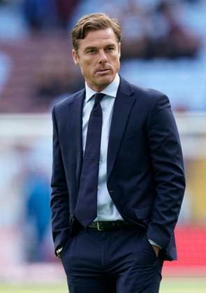 Birmingham, England, 5th October 2025. Scott Parker manager of Burnley during the Aston Villa vs Burnley Premier League match at Villa Park, Birmingham. Picture credit should read: Andrew Yates Sportimage EDITORIAL USE ONLY. No use with unauthorised audio, video, data, fixture lists, club league logos or live services. Online in-match use limited to 120 images, no video emulation. No use in betting, games or single club league player publications. SPI_005_VILLA_BURNLEY SPI-4198-0005