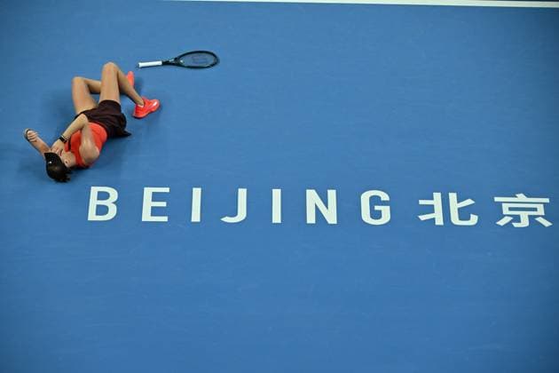 (251005) -- BEIJING, Oct. 5, 2025 -- Amanda Anisimova reacts after winning the women s singles final match between Amanda Anisimova of the United States and Linda Noskova of the Czech Republic at 2025 China Open tennis tournament in Beijing, China, Oct. 5, 2025. ) (SP)CHINA-BEIJING-TENNIS-CHINA OPEN-WOMEN S SINGLES-FINAL (CN) HuxJingwen 