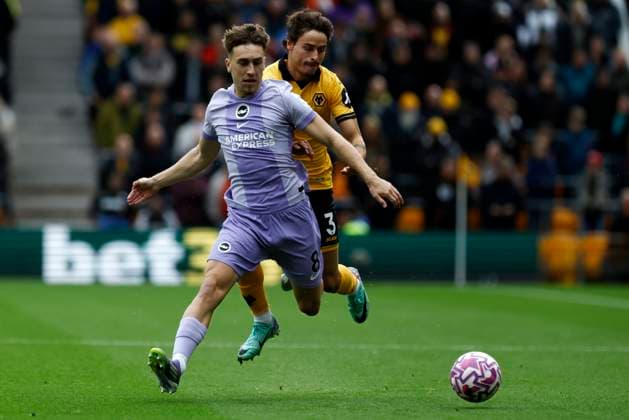 Wolverhampton Wanderers v Brighton and Hove Albion Premier League Brajan Gruda of Brighton and Hove Albion holds off Hugo Bueno of Wolverhampton Wanderers during the Premier League match at Molineux, Wolverhampton UK Newspapers OUT Copyright: xJackxTylerx FIL-22325-0068