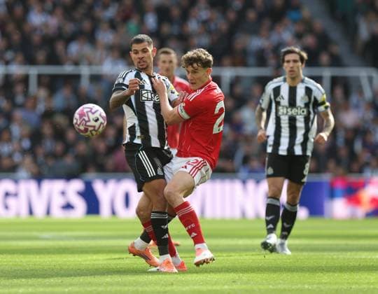 Newcastle Upon Tyne, England, 5th October 2025. Bruno Guimaraes (L) of Newcastle United in action with Ryan Yates of Nottingham Forest during the Newcastle United vs Nottingham Forest Premier League match at St. James Park, Newcastle Upon Tyne. Picture credit should read: Nigel Roddis Sportimage EDITORIAL USE ONLY. No use with unauthorised audio, video, data, fixture lists, club league logos or live services. Online in-match use limited to 120 images, no video emulation. No use in betting, games or single club league player publications. SPI_015_NR_NEWC_NOTT SPI-4199-0015